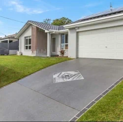A decorative concrete driveway that has been freshly resurfaced in a home in Perth